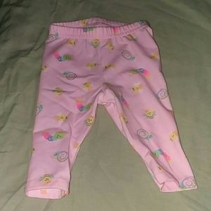Pink pants with bugs on them